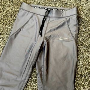 Nike Running Leggings. Silver/grey. Never worn. NWOT